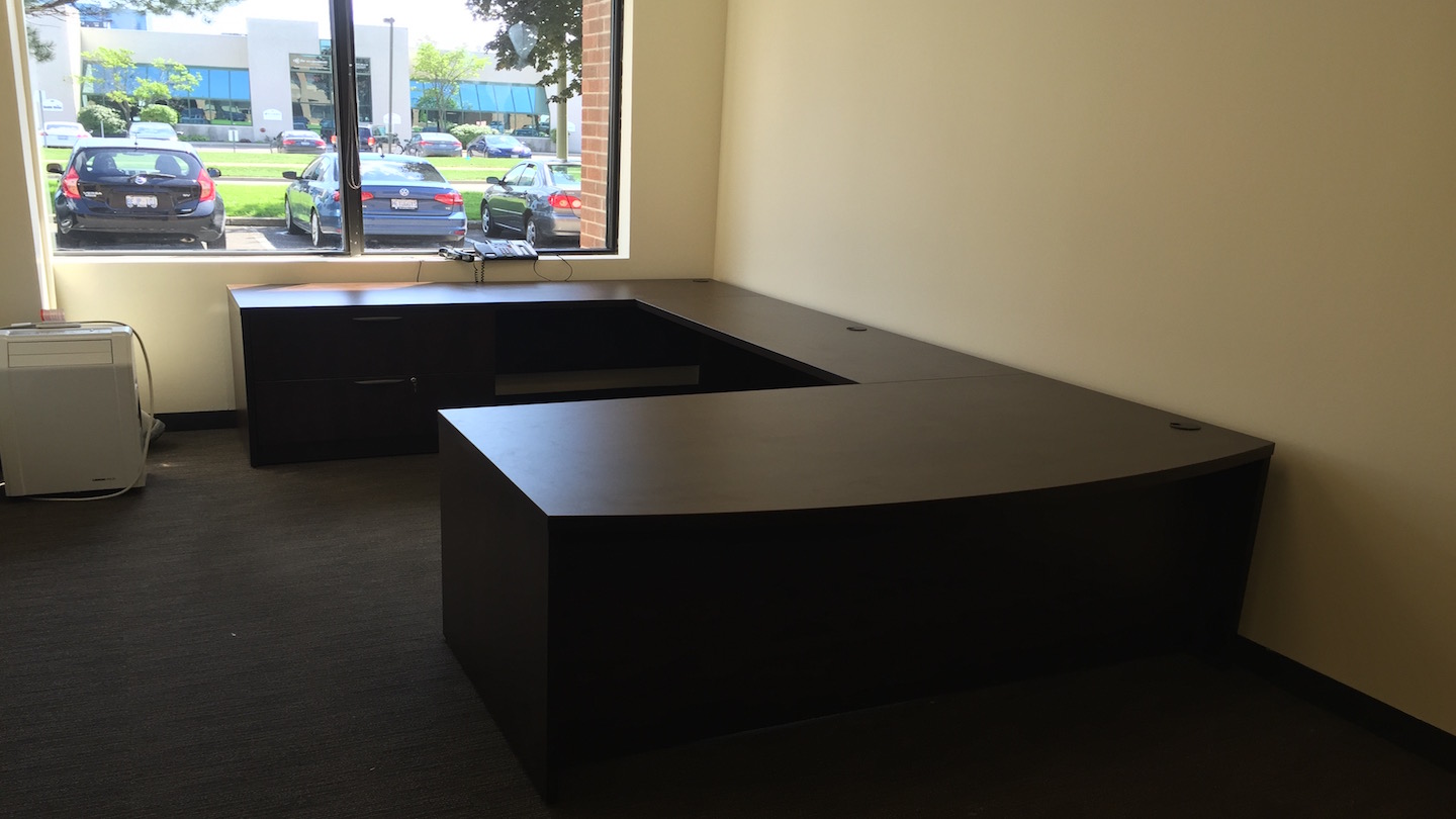 An office desk installed for a personal office.