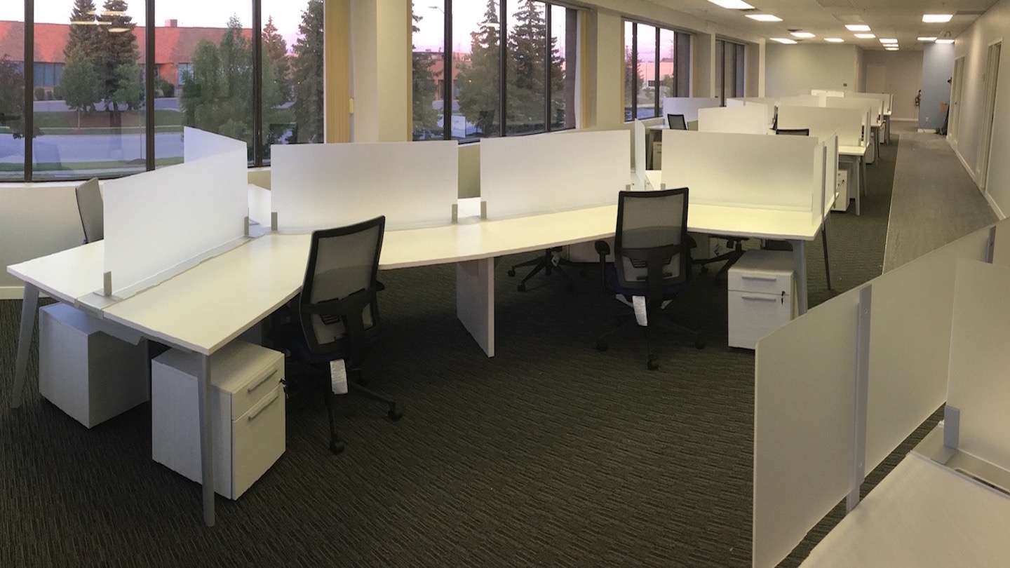 Many open concept cubicles delivered and installed for an office.